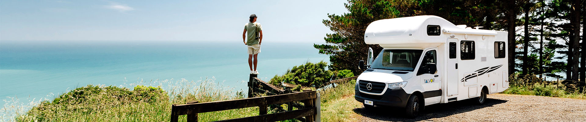 Talvor motorhome with man overlooking the ocean